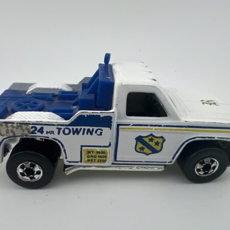 white and blue tow truck diecast vehicle 24 hour towing side view right profile