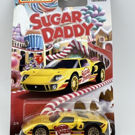 sugar daddy candy themed diecast car in packaging yellow sports car collectible