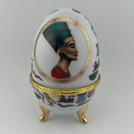 Egyptian Faberge egg trinket box Nefertiti portrait front view white enamel gold base collectible