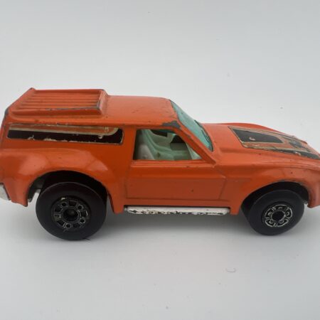 Vintage 1975 Matchbox Lesney Superfast No 34 Vantastic orange diecast van made in England right side view with wear