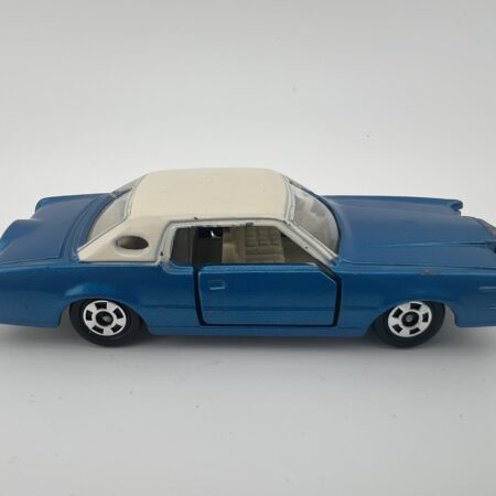 blue convertible diecast car with white roof side view right profile vintage toy