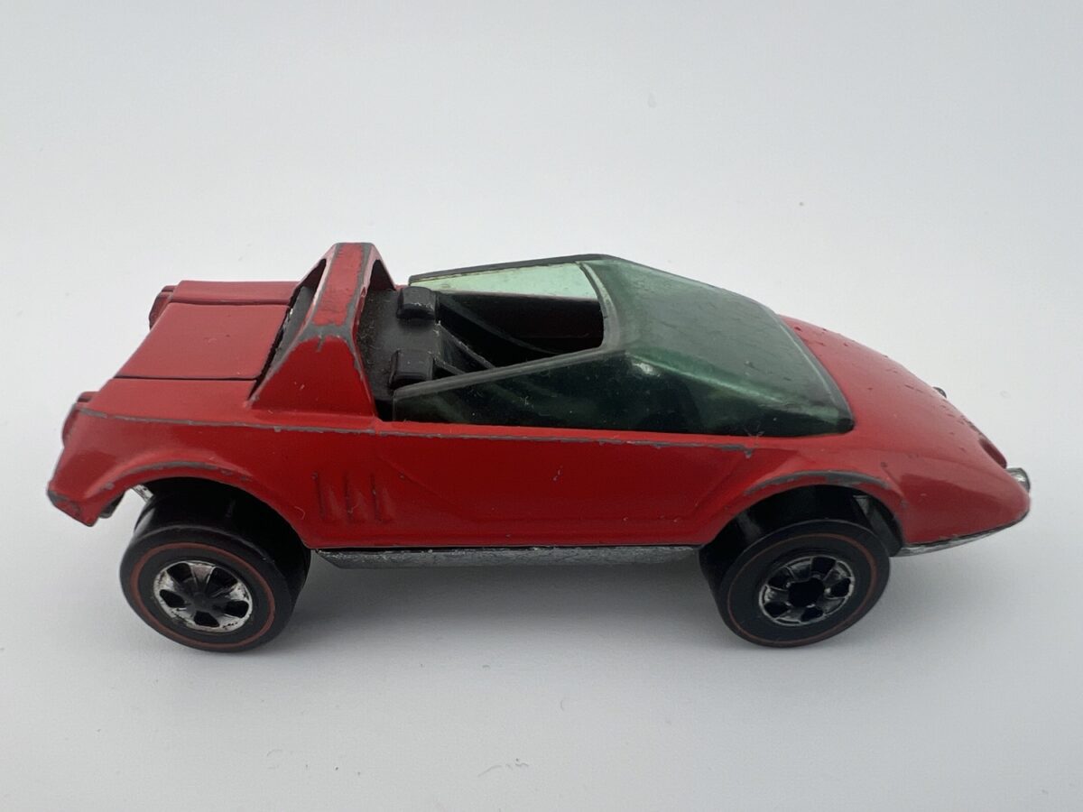 what makes a hot wheels car valuable red Hot Wheels dune buggy convertible side view black interior off road style vehicle