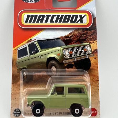 Matchbox 1970 Ford Bronco diecast car in green with original packaging, 1:64 scale collectible vehicle by Mattel